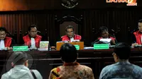 Dalam sidang tersebut, Saksi Susi Tur Andayani mengatakan bahwa ia mendapat SMS dari Akil Mochtar permintaan uang sebesar 3 M di Pengadilan Tipikor Jakarta, Kamis (10/4/2014) (Liputan6.com/Faisal R Syam).