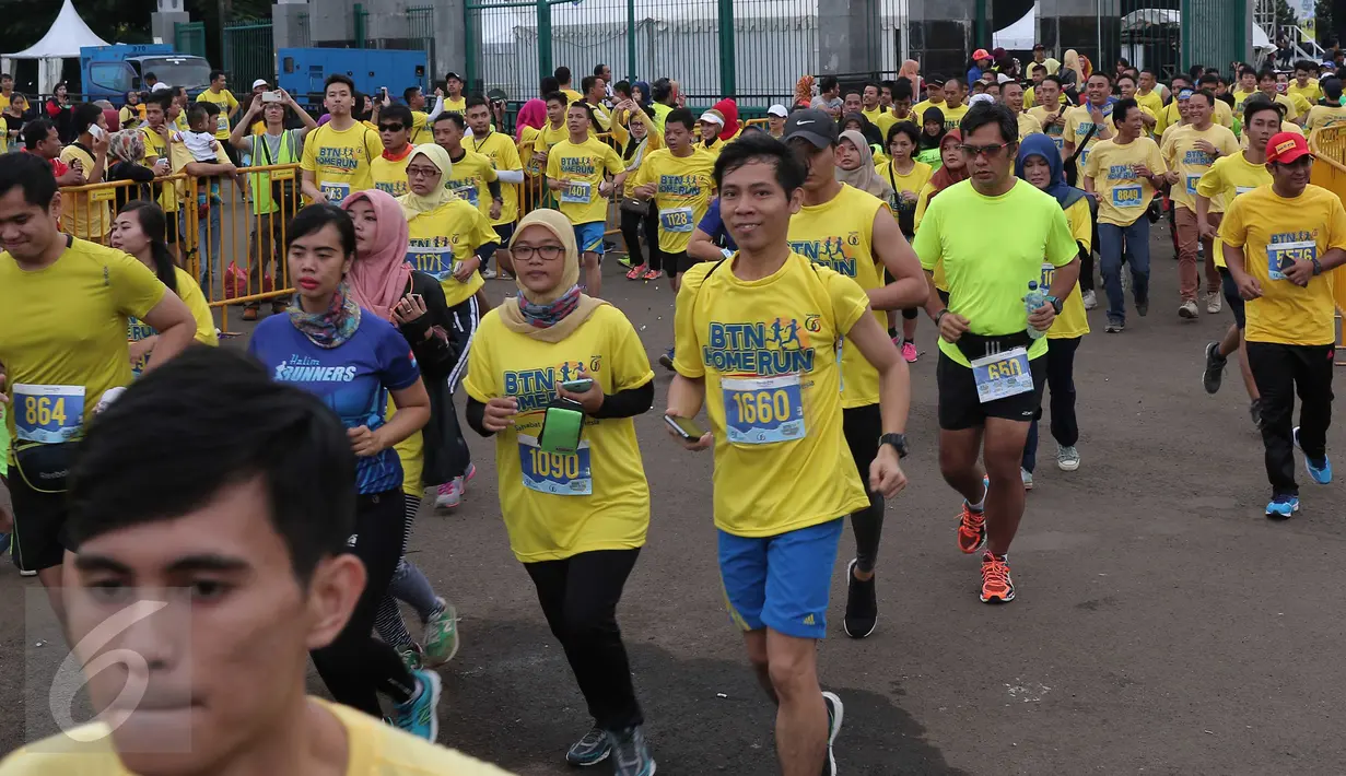 Peserta antusias mengikuti home run in harmony di Senayan, Jakarta, Minggu (21/2). Di usia yang semakin matang, BTN semakin memantapkan posisinya sebagai bank berplat merah yang cukup ekspansif di sektor pembiayaan perumahan. (Liputan6.com/Angga Yuniar)