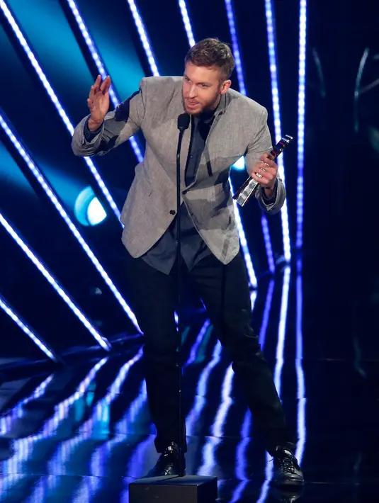 Calvin Harris menciptakan lagu yang bertajuk 'Ole'. Lagu tersebut berisi lirik sindiran yang ditujukan untuk Taylor Swift. (AFP/Bintang.com)