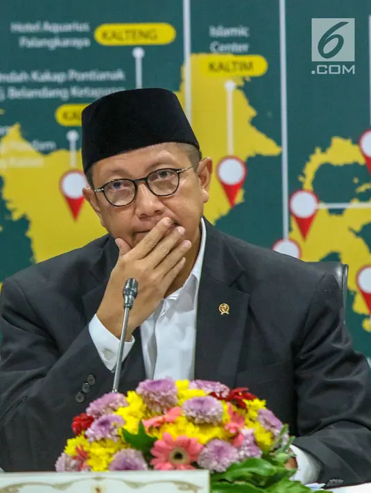 Menteri Agama Lukman Hakim Saifuddin menyampaikan hasil Sidang Isbat penentuan awal Ramadan 1440 Hijriah di Kementerian Agama, Jakarta, Minggu (5/5/2019). Pemerintah menetapkan 1 Ramadan 1440 Hijriah jatuh pada hari Senin, 6 Mei 2019. (Liputan6.com/Helmi Fithriansyah)