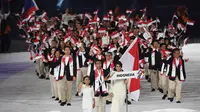 Atlet dan official Indonesia saat mengikuti opening ceremony SEA Games ke-29 di  Kuala Lumpur, Malaysia (19/8/2017). (AFP/Adek Berry)