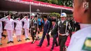 Presiden Joko Widodo didampingi Wakil Presiden, Jusuf Kalla bersiap melakukan upacara Hari Kesaktian Pancasila, di Halaman Monumen Pancasila Sakti, Jakarta, Minggu (1/10). (Liputan6.com/Faizal Fanani)
