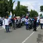 Para buruh FSPMI Cirebon Raya menggelar aksi May Day dengan aksi turun  ke jalan menolak PP Pengupahan hingga menawal pemilu. Foto (Liputan6.com / Panji Prayitno)