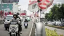 Partai politik semestinya memberikan pendidikan politik yang benar. Oleh karena itu, partai politik seharusnya patuh dengan tidak memasang alat peraga kampanye di zona terlarang. (Liputan6.com/Faizal Fanani)