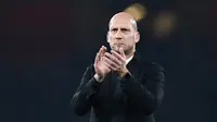 Mantan pemain Manchester United yang kini melatih Reading, Jaap Stam. (AFP/Justin Tallis)