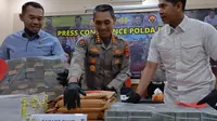 {enam[akam uang nyaris Rp1 miliar hasil korupsi di Polda Banten. (Selasa, 03/10/2023). (Yandhi Deslatama/Liputan6.com).