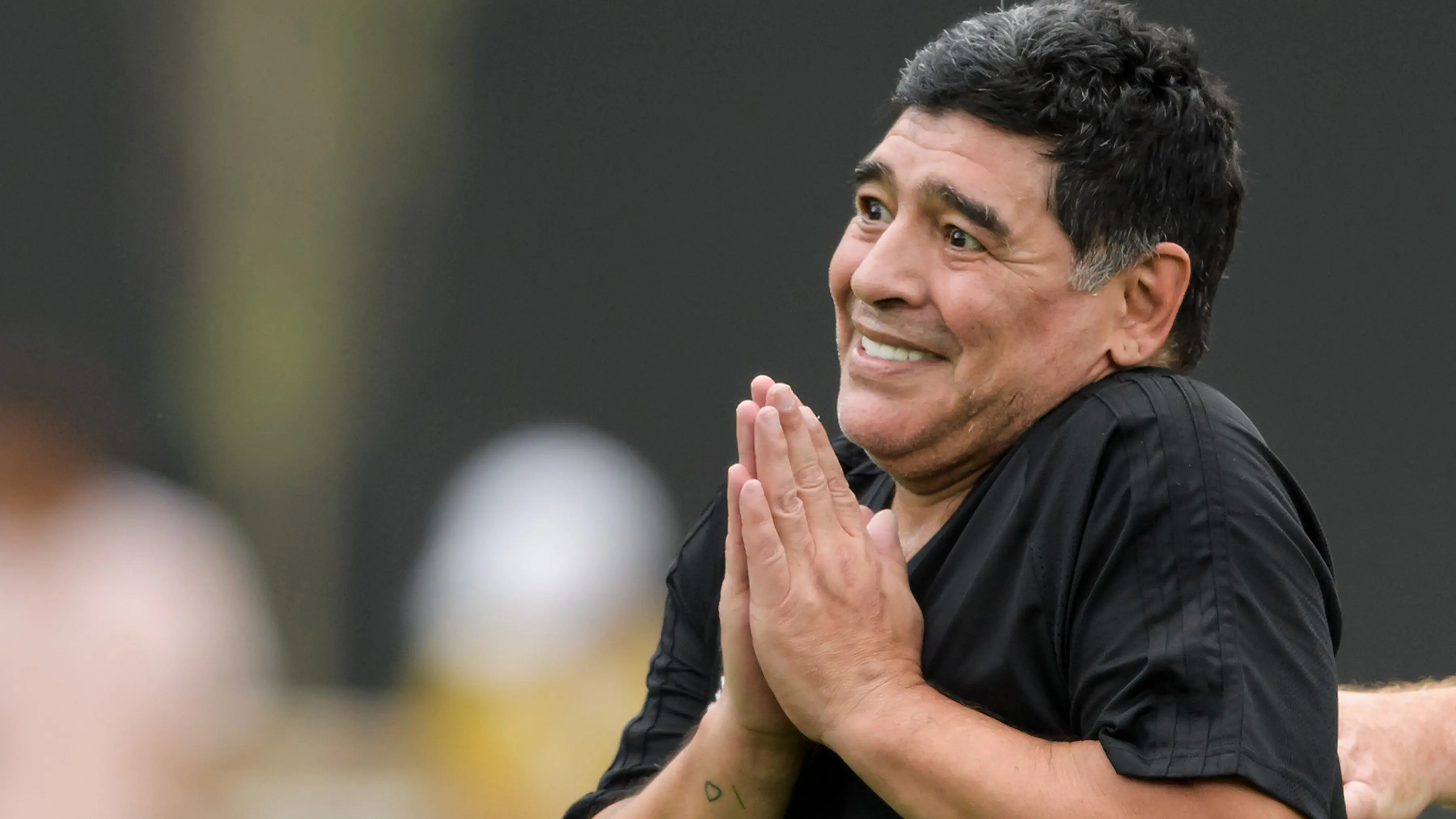 Bintang sepak bola dunia Diego Maradona (AFP/Fabrice Coffrini)