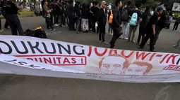 Dalam aksinya, mereka meminta kepada pemerintahan baru untuk melakukan terobosan dan perubahan yang berpihak pada korban secara signifikan, Jakarta, Kamis (11/12/2014). (Liputan6.com/Miftahul Hayat)