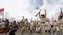 Sorak Kemenangan bangsa Indonesia yang berhasil mengusir penjajah Belanda dalam aksi teatrikal di kawasan Monas, Jakarta, Jumat (12/12/2014) (Liputan6.com/Faizal Fanani)