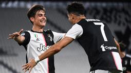 Paulo Dybala jadi pemain lain yang pernah satu tim dengan Lionel Messi dan Cristiano Ronaldo. Dybala satu tim dengan CR7 di Juventus dan sempat jadi kombinasi maut. (Foto: AFP/Marco Bertorello)