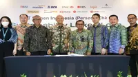 SIG dan SBI menandatangani Perjanjian Kredit Sindikasi Sustainability Linked Loan (SLL) dengan 12 perbankan sebagai kreditur yang merupakan salah satu program untuk mewujudkan komitmen terhadap implementasi prinsip ESG di Jakarta, Senin, 19 Desember 2022. (Foto: SIG)