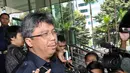 Dirut PT Assa Nusa Indonesia Paul Nelwan saat menjawab pertanyaan wartawan yang menunggunya di Gedung KPK, Jakarta, (30/9/14). (Liputan6.com/Miftahul Hayat)