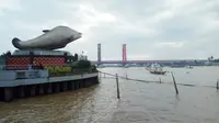 Jembatan Ampera yang membentang di Sungai Musi Palembang (Liputan6.com / Nefri Inge)