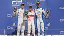 2.	Rio Haryanto berpose di podium bersama peringkat 2, Stoffel Vandoorne (kiri) dan peringkat 3, Nathanael Berthon. (photo by gp2series)