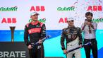 Pembalap Avalanche Andretti, Jake Dennis (kiri) melakukan selebrasi setelah finis kedua pada balapan Jakarta E-Prix 2023 round-11 di Jakarta International E-Prix Circuit, Ancol, Jakarta, Minggu (04/06/2023). (Bola.com/Bagaskara Lazuardi)