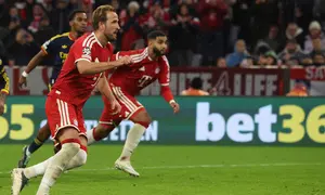 Selebrasi Harry Kane saat Munchen melawan Arsenal di Liga Champions (AFP)