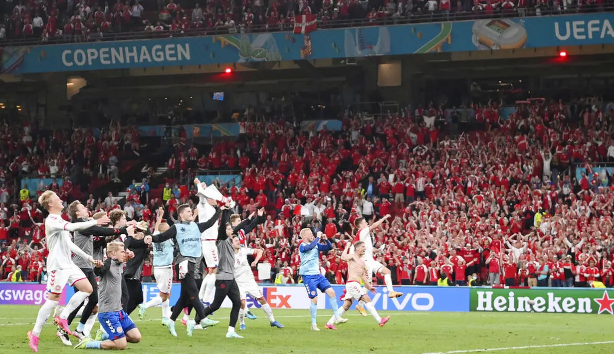 Denmark untuk pertama kalinya lolos dari babak penyisihan Euro setelah terakhir kali melakukannya pada Euro 2004. Selanjutnya mereka akan menghadapi  runner-up Grup A, Wales di babak 16 besar Euro 2020. (Stuart Franklin/Pool via AP)