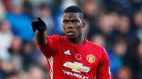 Ekspresi Paul Pogba saat merayakan gol pertama untuk MU pada pertandingan Liga Premier Inggris, Swansea City menjamu Manchester United di Stadion Liberty, Inggris (6/11). Pogba berhasil menyumbang satu gol untuk MU. (Reuters/John Sibley)