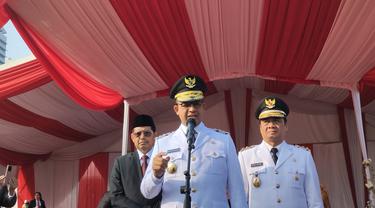 Gubernur DKI Jakarta Anies Baswedan menjadi Inspektur Upacara pada peringatan Hari Ulang Tahun (HUT) ke-77 RI di Plaza Selatan, Monumen Nasional (Monas), Jakarta Pusat, Rabu (17/8/2022).
