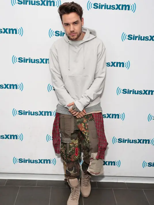“Yeah, benar! Aku telah meninggalkan istriku dan anak di rumah dan aku pergi untuk In-N-Out burger,” tutur Liam Payne saat diwawancara. (AFP/Bintang.com)