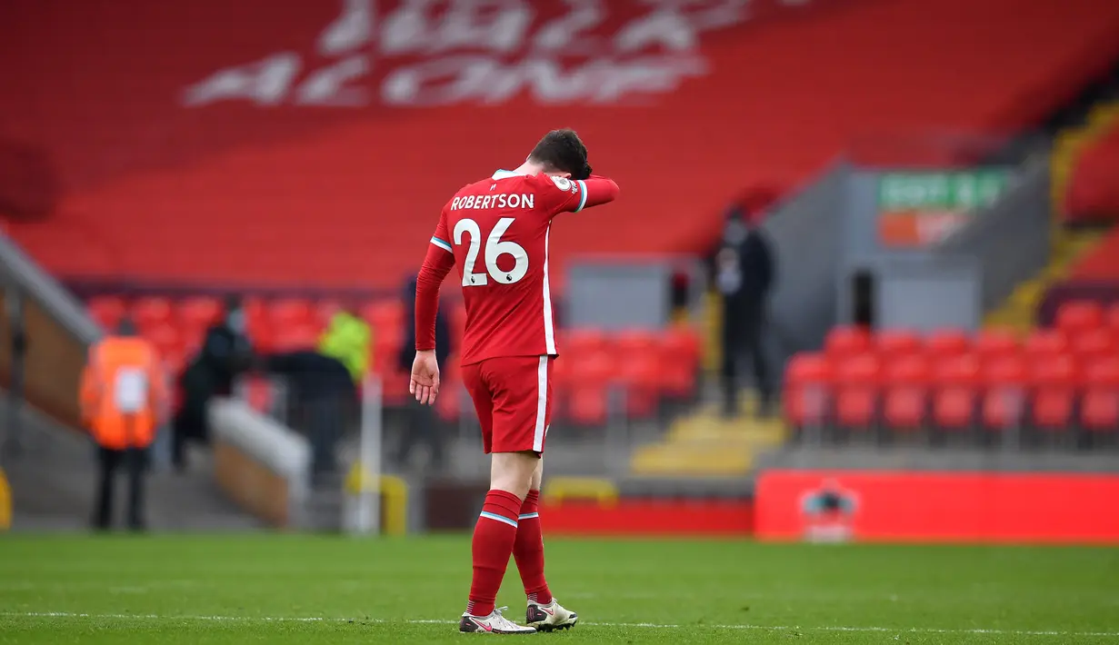 Reaksi pemain Liverpool, Andrew Robertson usai timnya dikalahkan Fulham dalam pertandingan lanjutan Liga Inggris. (Foto: AFP/Pool/Paul Ellis)