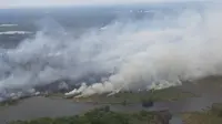 Foto dari udara kebakaran lahan yang terjadi di Provinsi Riau. (Liputan6.com/Dok Lanud Roesmin Nurjadin)