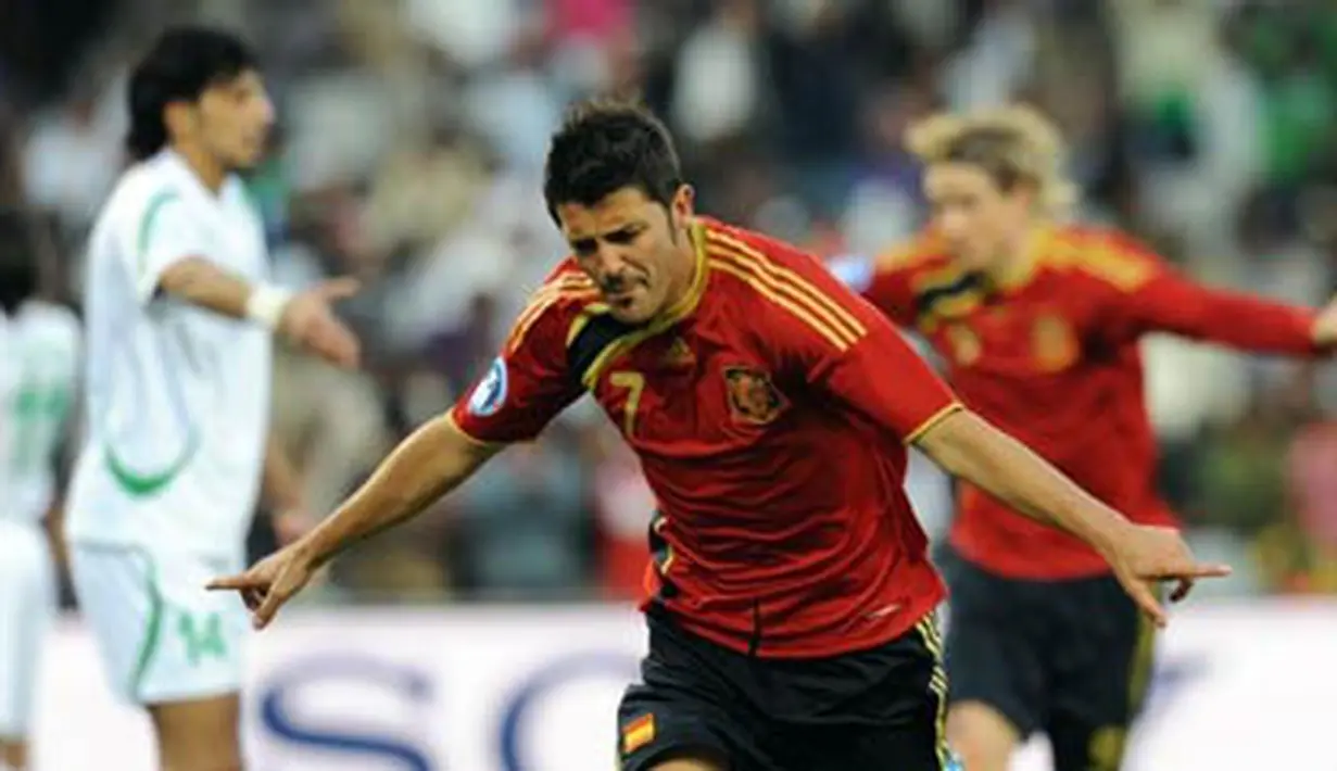Selebrasi striker Spanyol, David Villa setelah menjebol gawang Irak di Piala Konfederasi pada 17 Juni 2009 di Free State Stadium, Bloemfontein, Afrika Selatan. AFP PHOTO/ALEXANDER JOE