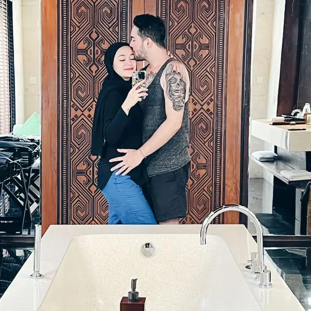 6 Potret Liburan Aryani Fitriana dan Donny Michael Bareng Anak, Lepas Penat