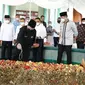 Menteri BUMN, Erick Thohir, bersama Menteri Perdagangan, M Lutfi, melakukan ziarah ke makam Haji Anif Bin Gulrang Shah di halaman Masjid Al Musannif Cemara Asri, Kabupaten Deli Serdang, Sumatera Utara (Sumut)