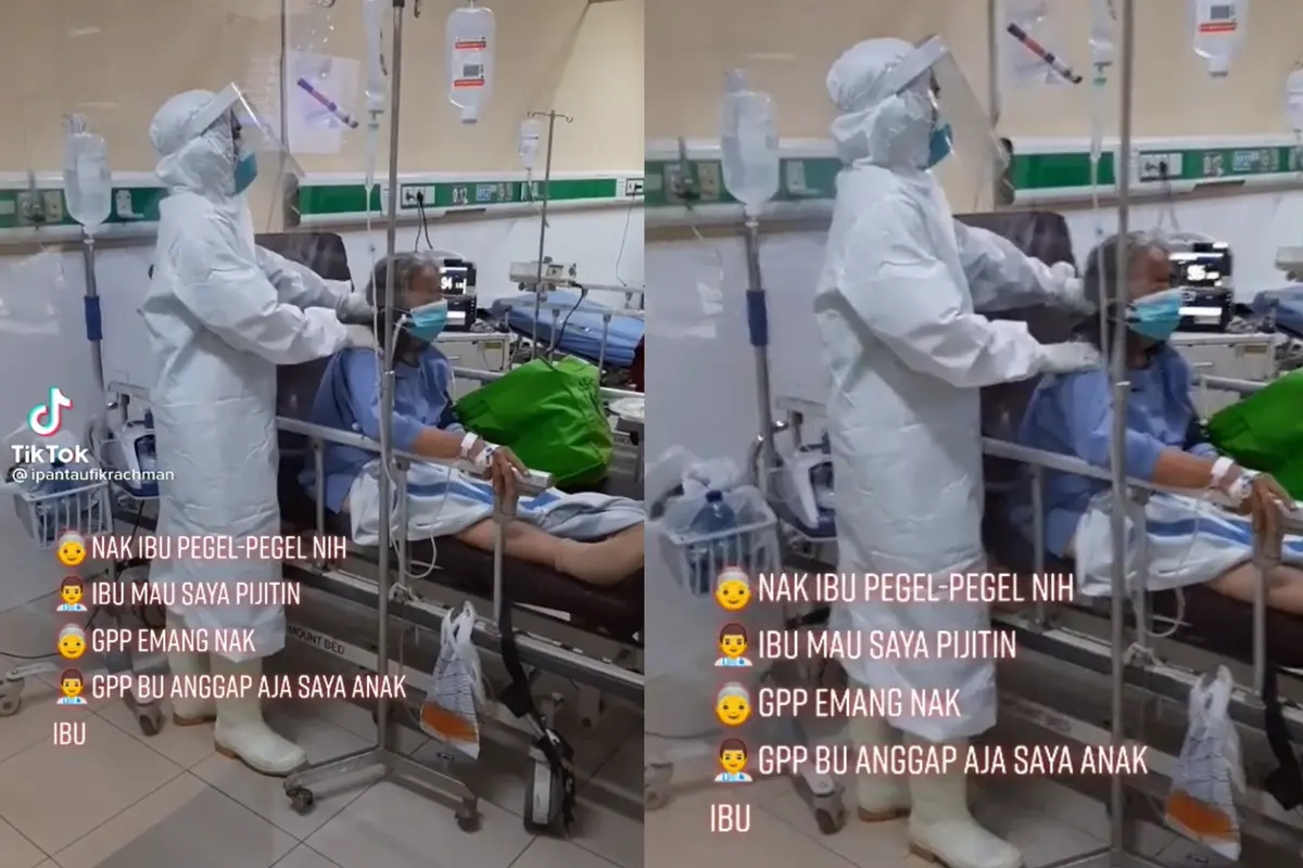 Seorang perawat memijat salah satu pasien rawat inap.