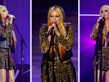 Foto kombinasi Avril Lavigne saat tampil di atas panggung Academy of Country Music Honours ke-15 di Ryman Auditorium di Nashville, Tennessee pada 24 Agustus 2022. (AFP Photo)