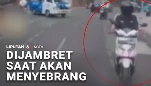 Dijambret saat akan Menyeberang