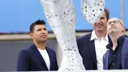Gol itu membawa Man City trofi Liga Inggris pertama setelah 44 tahun puasa gelar. Saat itu City yang mengalahkan sang rival Manchester United dengan selisih gol berkat aksi heroik Aguero. (Martin Rickett/PA via AP)