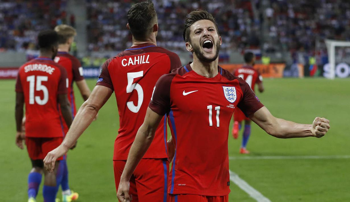 Gelandang Inggris, Adam Lallana, merayakan gol yang dicetaknya ke gawang Slovakia pada laga kualifikasi Piala Dunia 2018 di Stadion Antona Malatinskeho, Trnava, Slovakia, Minggu (4/9/2016). Inggris menang 1-0 atas Slovakia. (Reuters/Carl Recine)