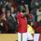 Ekspresi pemain Manchester United, Romelu Lukaku setelah mencetak gol ke gawang Basel pada laga grup A Liga Champions di Old Trafford, Manchester, (12/9/2017). MU menang 3-0. (AP/Frank Augstein)