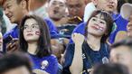 Sejumlah seporter wanita menghiasi tribun penonton saat tim sepak bola Kamboja berhadapan dengan Filipina di National Stadium, Phnom Penh, Kamboja, Selasa (2/5/2023). (Bola.com/Abdul Aziz)