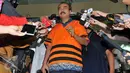 Tersangka kasus dugaan suap proyek Pembangkit Listrik Tenaga Mikrohidro di Papua tahun anggaran 2016, Bambang Wahyuhadi memberi keterangan seusai menjalani pemeriksaan di Gedung KPK, Jakarta, Selasa (3/11). (Liputan6.com/Helmi Afandi)