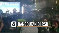 Beredar video acara dangdutan yang digelar di Rumah Sakit Darurat Wisma Atlet. Terlihat kerumunan yang sedang berjoget dan menikmati musik dangdut.