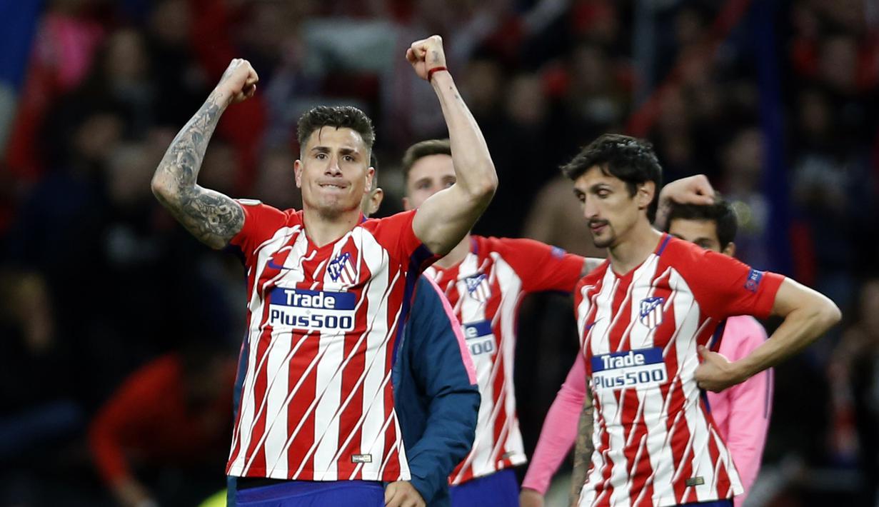 Pemain Atletico merayakan keberhasilan timnya lolos ke final Liga Europa usai mengalahkan Arsenal di Wanda Metropolitano stadium, Madrid, (3/5/2018). Atletico menang 1-0. (AP/Francisco Seco)