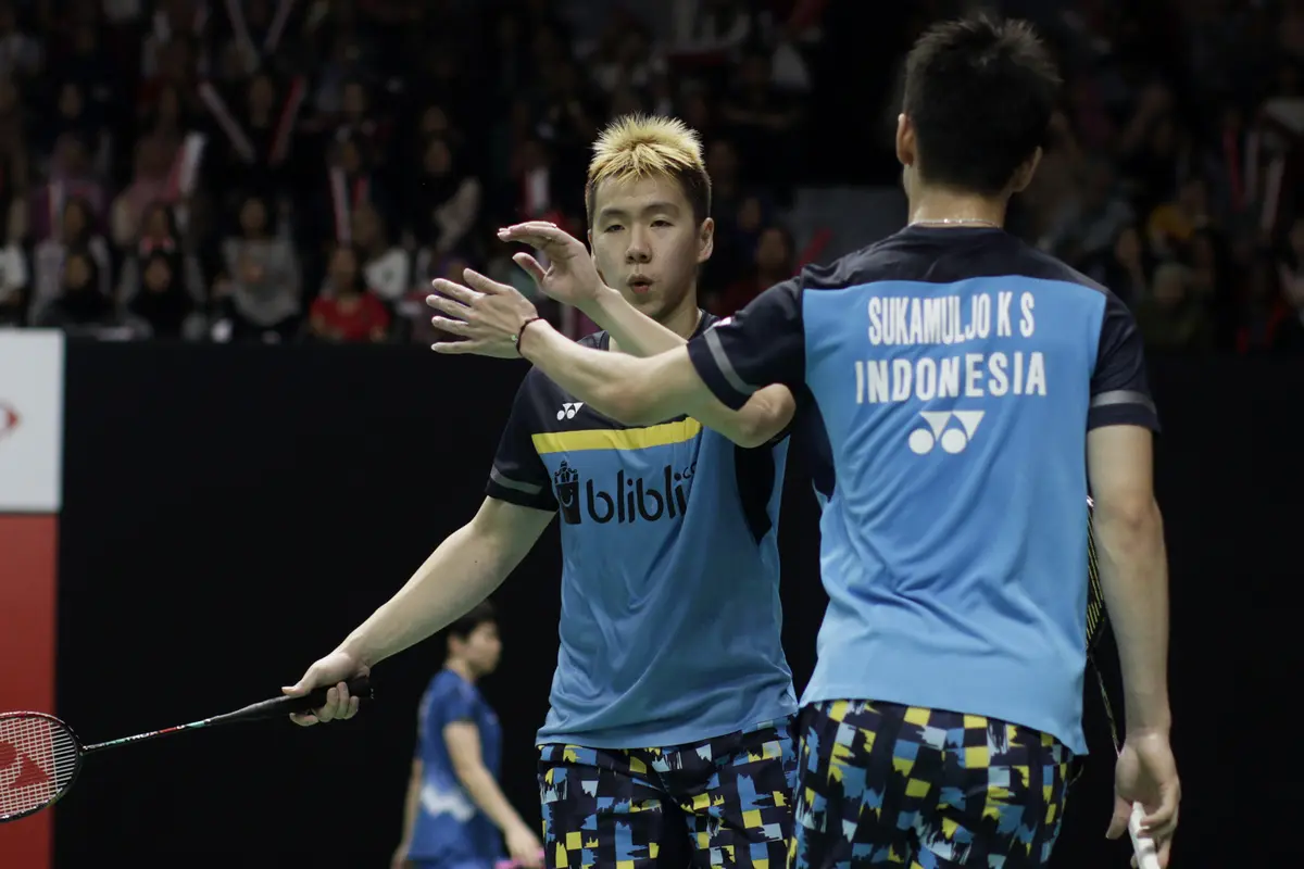 Ganda putra Indonesia, Kevin Sanjaya / Marcus Gideon, merayakan kemenangan atas rekan senegaranya. (Bola.com/Yoppy Renato)