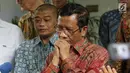 Mahfud MD bersama para tokoh Gerakan Suluh Kebangsaan memberi keterangan usai melakukan pertemuan dengan Presiden RI kelima, Megawati Soekarnoputri di Jakarta, Jumat (17/5/2019). Pertemuan berlangsung tertutup. (Liputan6.com/Helmi Fithriansyah)