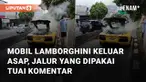 Sebuah mobil sport Lamborghini Aventador keluar asap di jalanan