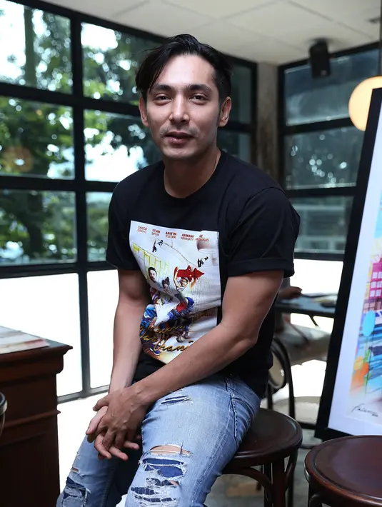Film 'Negeri Van Oranje' yang mengambil lokasi syuting di negeri kincir angin, Abimana memerankan tokoh Wicak. (Galih W. Satria/Bintang.com)