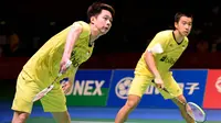 Ganda putra Indonesia, Kevin Sanjaya dan Marcus Gideon, berhasil mengalahkan ganda Jepang, Takuto Iniue dan Yuki Kaneko pada final Japan Open di Tokyo, Minggu (24/9/2017). Kevin/Marcus menang 21-12 dan 21-15 atas Iniue/Kaneko. (AFP/Toru Yamanaka)