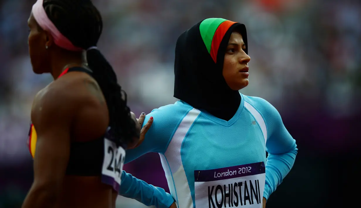 Tahmina Kohistani menjadi satu-satunya wanita yang mewakili Afganistan di Olimpiade London 2012. Kohistani berlomba di nomor lari 100m dan 200m putri. (AFP/Olivier Morin)