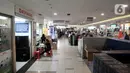Suasana sepi pengunjung di pusat perbelanjaan kawasan Glodok, Jakarta, Selasa (3/3/2020). Sejak Senin (2/3) kemarin Pusat perbelanjaan di Glodok mendadak sepi pengunjung akibat adanya pemberitaan terkait warga Depok positif terinfeksi virus Corona atau Covid-19. (merdeka.com/Iqbal S. Nugroho)