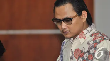 Riefan Avrian saat menjalani sidang vonis di Pengadilan Tipikor, Jakarta, Rabu (17/12/2014). (Liputan6.com/Miftahul Hayat)