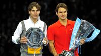 5. Tahun 2010 - Roger Federer (Swiss) berhadapan dengan Rafael Nadal (Spanyol) dalam partai final yang berlangsung di O2 Arena, London, Inggris (28/11/2010). Roger Federer menang dengan skor 6-3, 3-6, 6-1. (AFP/Glyn Kirk)