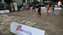 Aksi kocak dua peserta saat pertandingan 3 on 3 Futsal Challenge Road to BPL di Universitas Sahid, Jakarta. (Liputan6.com/Abdul Aziz Prastowo)