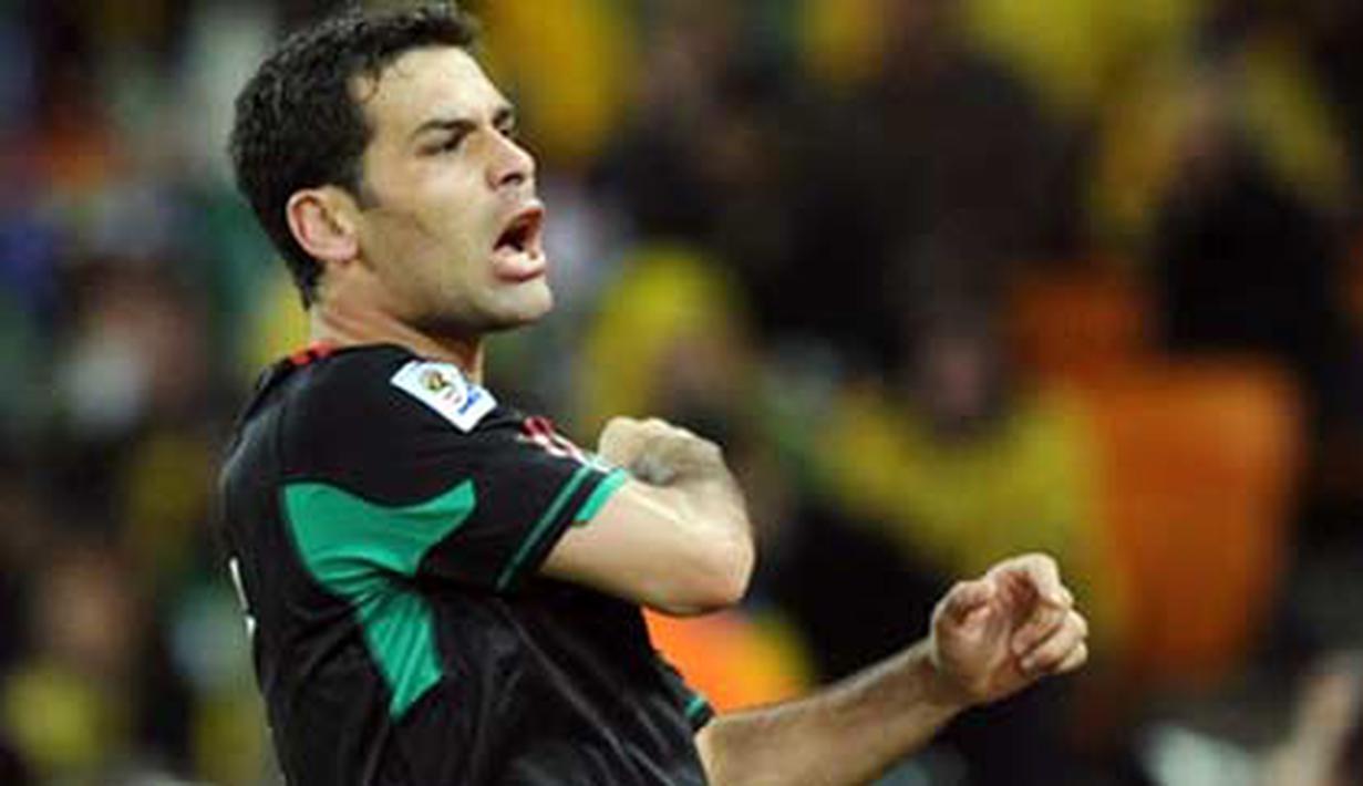 Selebrasi gol bek Meksiko Rafael Marquez ke gawang Afrika Selatan di partai perdana penyisihan Grup A PD 2010 di Soccer City, Johannesburg, 11 Juni 2010. Skor akhir 1-1. AFP PHOTO / PEDRO UGARTE
